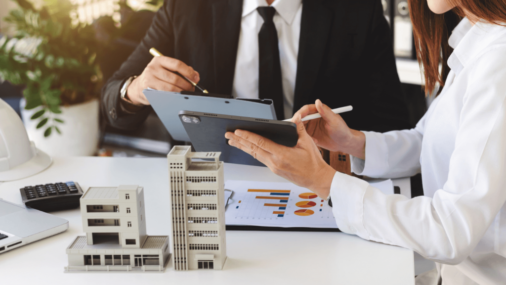 Mortgage in Dubai Mortgage agent discussing financial options with a client.